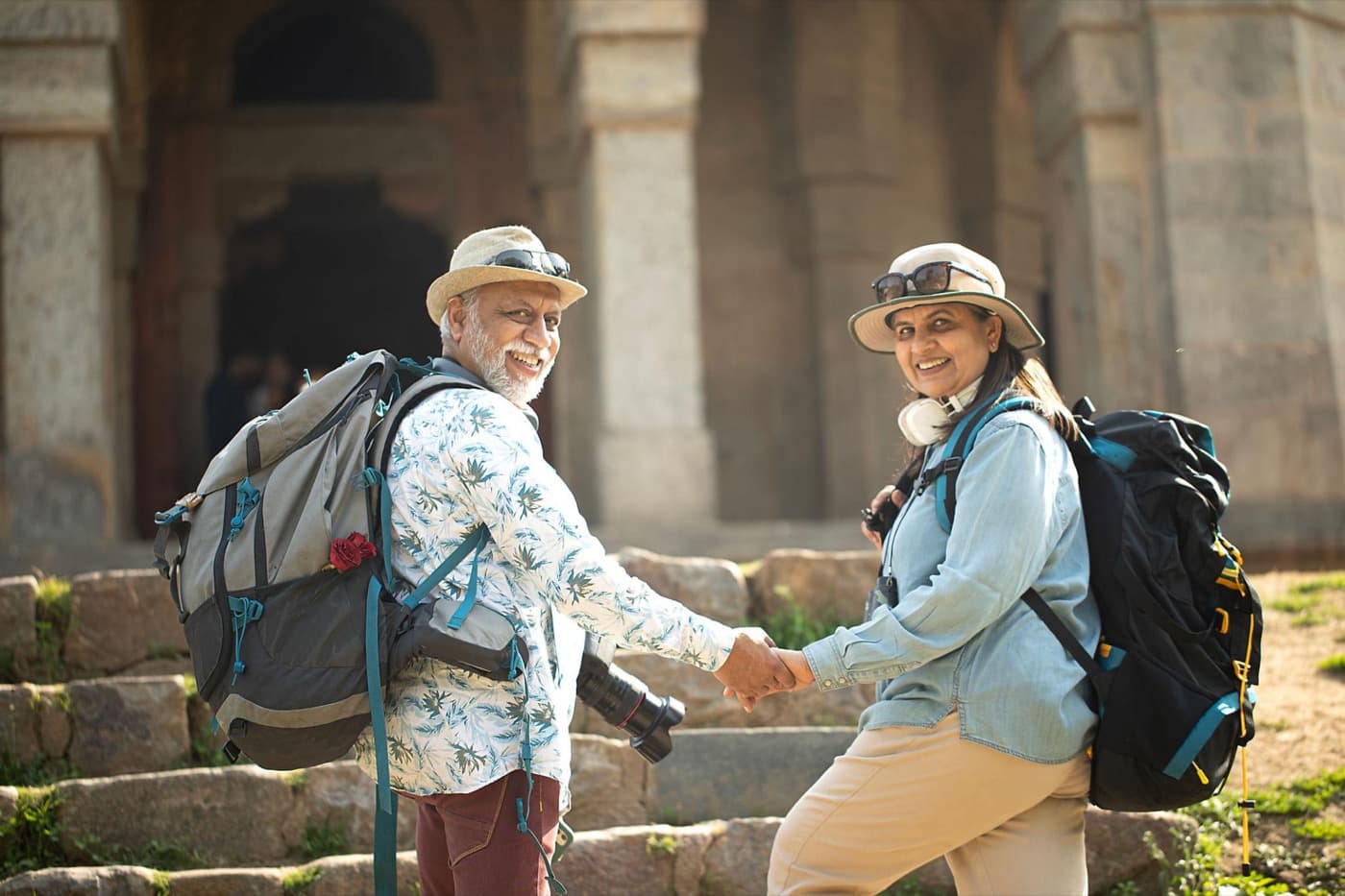 A senior couple exploring a heritage site together, hand in hand
